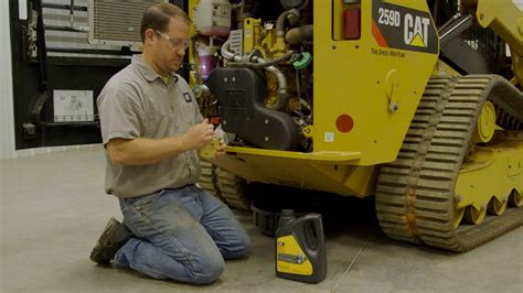 cat skid steer 246 oil plug|cat oil filler plug repair.